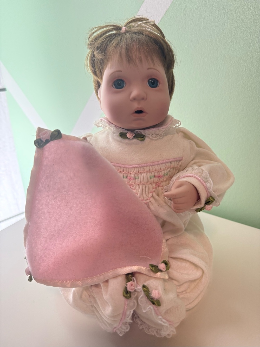 Porcelain-Style Baby Doll in Cream and Pink Outfit